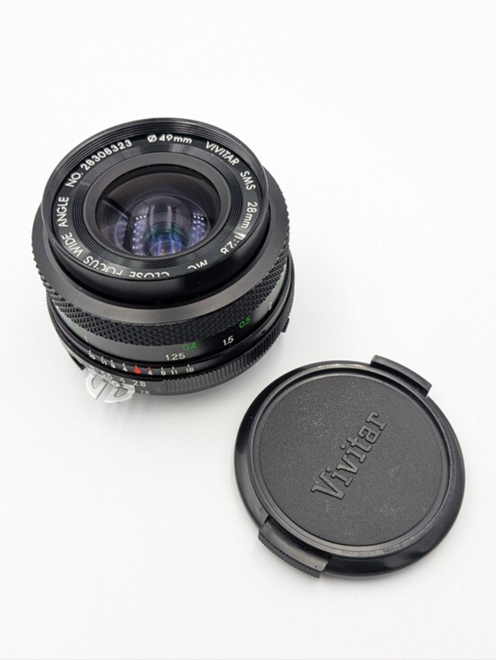 Vintage Vivitar 28mm f 2.8 manual wide lens Nikon mount N. 28XXXX